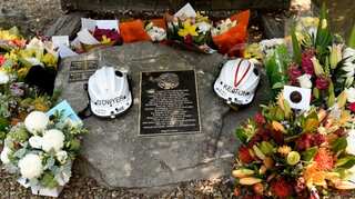 Australian leader curtails holiday as firefighters killed in huge blazes