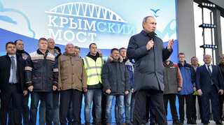 Russian President Putin inaugurates rail route to annexed Crimea