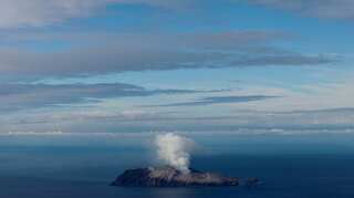 New Zealand police suspends search for two missing in volcanic eruption