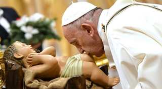 Pope Francis leads Christmas celebrations with midnight mass at Vatican