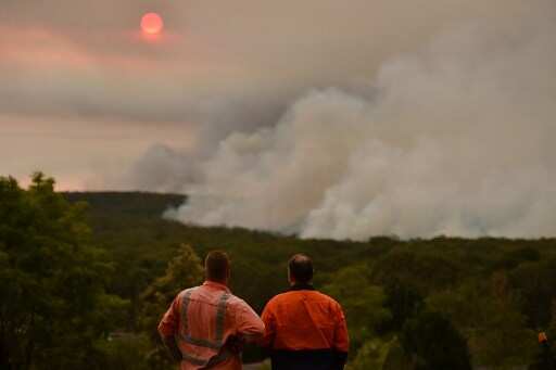 Firefighters in Australia spend Christmas Day containing wildfires