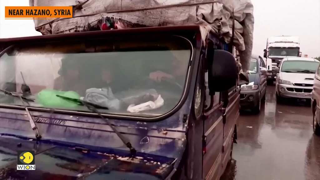 Families flee in fear as Russian-backed Syrian forces close in on rebel-held Idlib