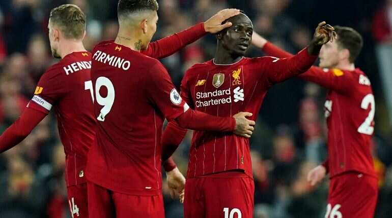 Premier League: Controversial Mane goal gets Liverpool past battling Wolves