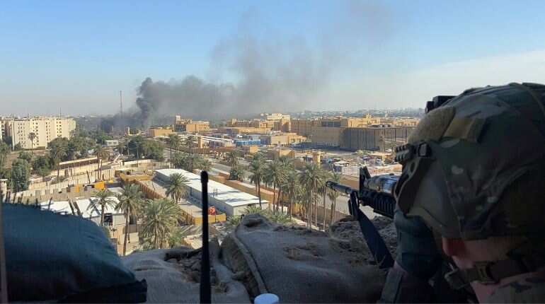 Protesters burn security post at US Embassy in Iraq; Pentagon sending additional troops to region