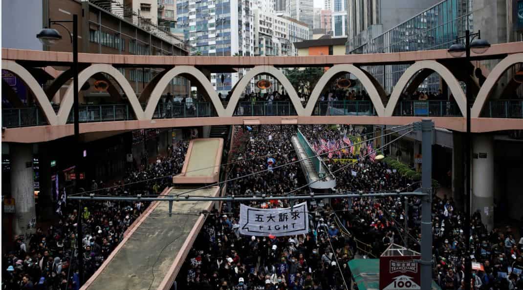 Hong Kong unrest: Protesters vow to 'keep fighting', police fire tear gas