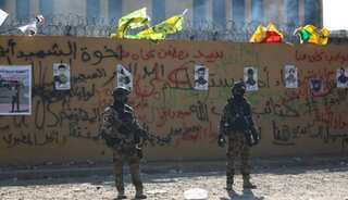 Iraqi militias withdraw from US embassy in Baghdad; more American troops deployed