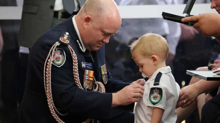 Toddler son receives posthumous medal for killed Australian firefighter