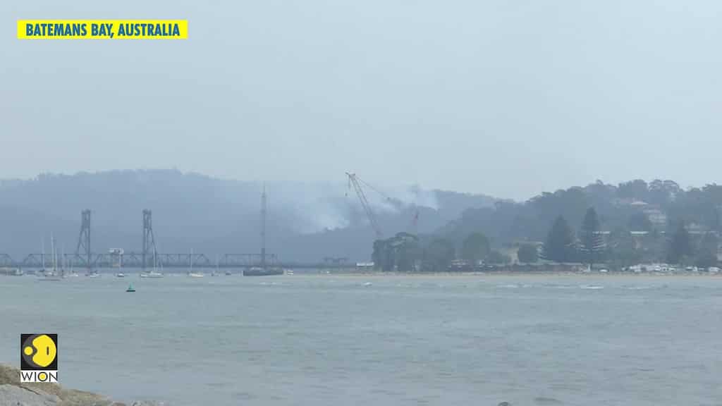 Thousands evacuate New South Wales south coast ahead of bushfire threat