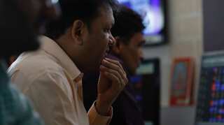 Shares slip, rupee weakens as oil jumps after US airstrikes in Iraq
