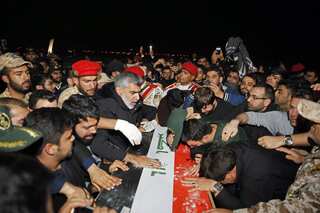 Thousands of mourners pay respect as Qasem Soleimani's last remains reach Iran