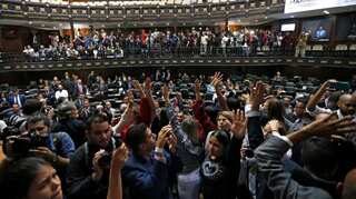 Venezuela's ruling Socialists seize congress, defiant opposition re-elects Guaido