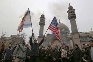 At least 50 killed in stampede at Iranian general's funeral, burial postponed