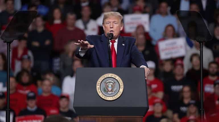 Trump tears into environmental 'doom' mongers at Davos forum