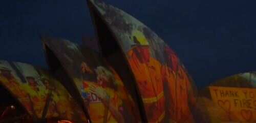 Sydney pays tribute to firefighters by illuminating images on Opera House