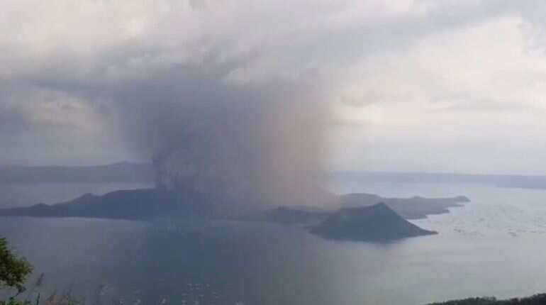 Philippines suspends Manila airport flights as volcano spews ash