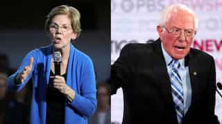 Trump backs Sanders in row with Warren over prospect of female US president