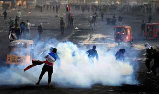 4 people including two policemen killed as protests erupt in Iraq