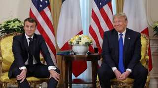 Emmanuel Macron and Donald Trump declare truce in digital tax dispute