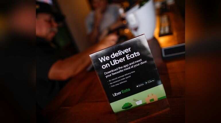 Uber cuts losses from Eats business in India with sale to Zomato Uber cuts losses from Eats business in India with sale to Zomato