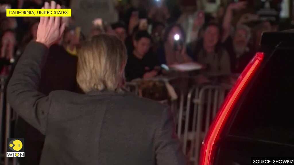 Brad Pitt stops traffic in Santa Barbara, says he doesn't have a date for the Oscars