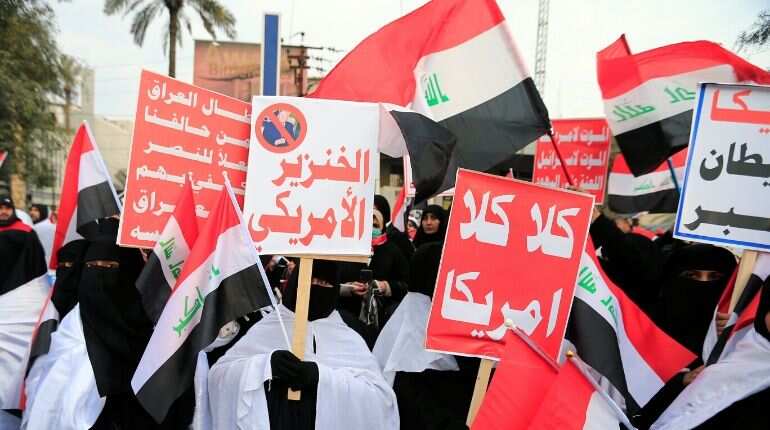 Thousands join anti-US rally in Baghdad, rattling rival protesters Thousands join anti-US rally in Baghdad, rattling rival protesters