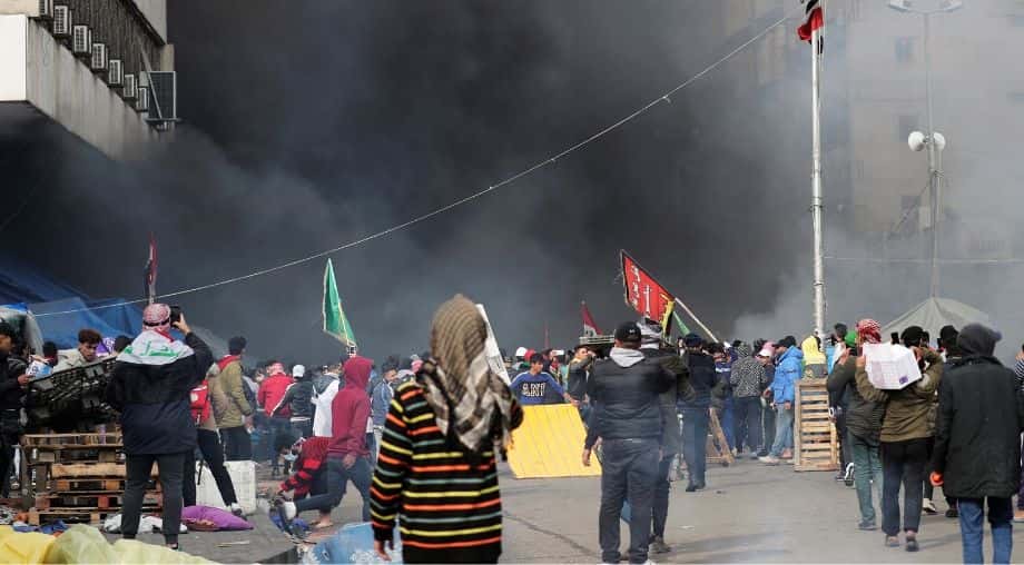 Iraqi security forces raid Baghdad's main protest camp, shoot at demonstrators