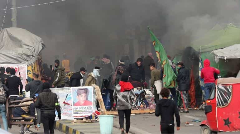 Iraqi security forces raid protest camps after Sadr supporters withdraw