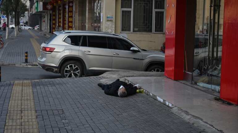 Watch- Man lying dead on streets of Wuhan, epicentre of coronavirus