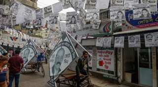 Bangladesh capital awash with plastic-coated posters