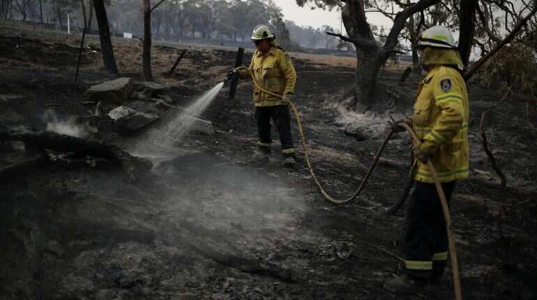 Bushfire smoke blows into Australia's capital as fire threat eases