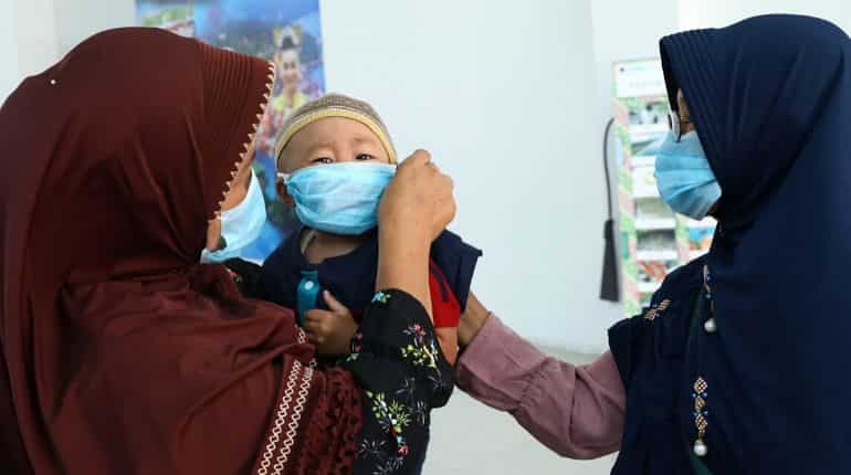 As Indonesian evacuees return from Wuhan, locals protest against the move to quarantine them