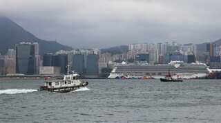 Thousands held on cruise ship in Hong Kong as authorities check for virus