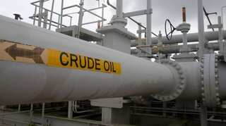Oil prices jump 2 per cent as virus vaccine reports spur hope