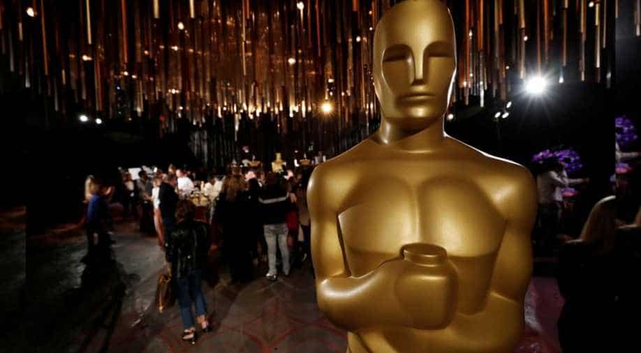 Oscars to admit streamed films next year as coronavirus upends movie going