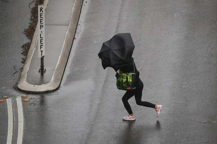 Bushfires, cyclone, torrential rain hit Australia's coasts