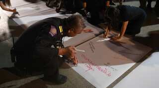 Thai city holds vigil for 29 victims of 'unprecedented' mass shooting