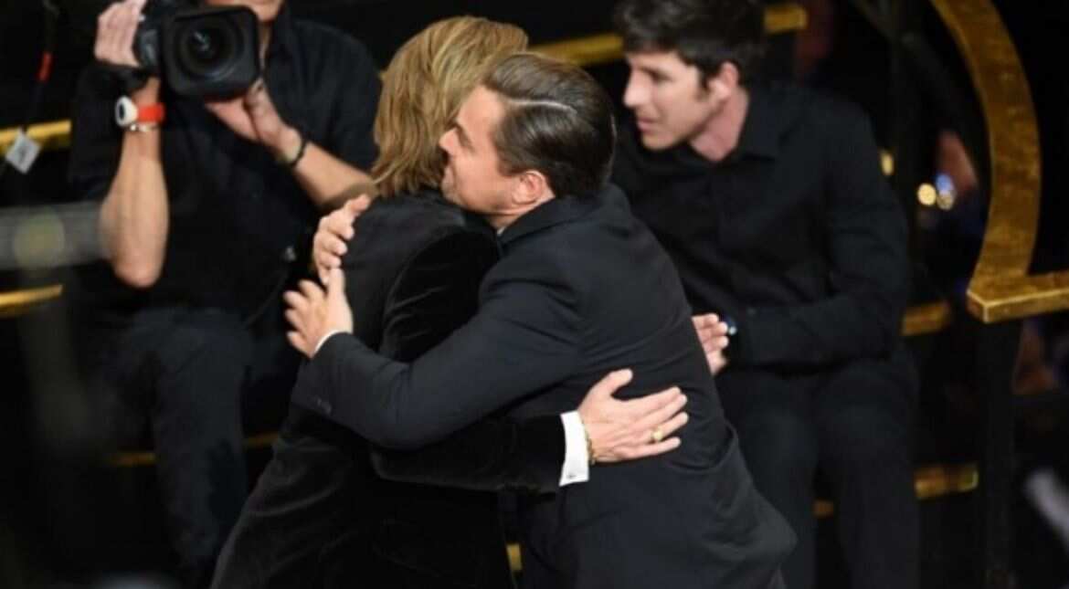 Brad Pitt and Leonardo's hug