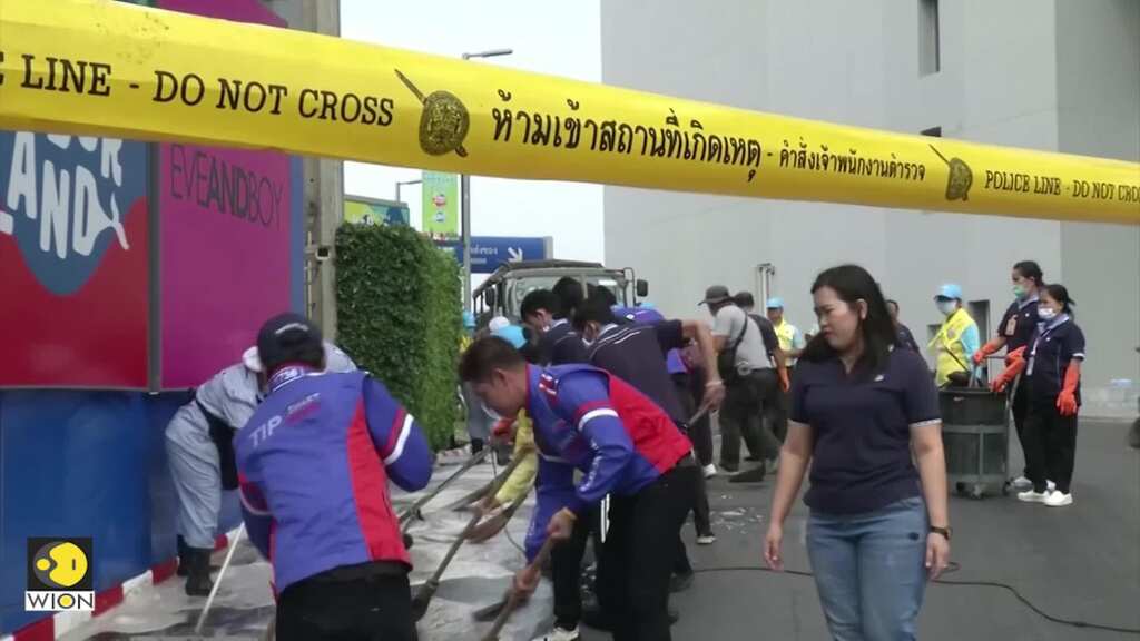 Thai volunteers, soldiers clean bloodstains after deadly mall shooting