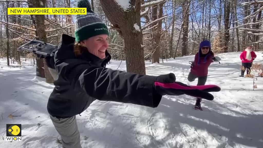 Voters in snowy New Hampshire de-stress with snowshoe yoga