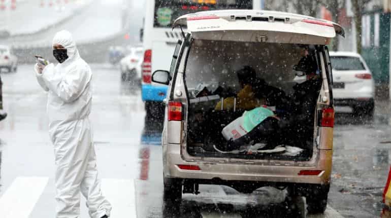 Chinese tourist dies in France as coronavirus cases show slight decline
