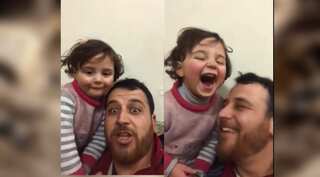Watch: To cope with war trauma, Syrian father and daughter turn bombing sounds into rosy game