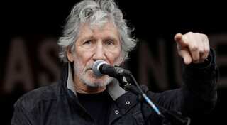 Pink Floyd co-founder joins Assange supporters in London protest march