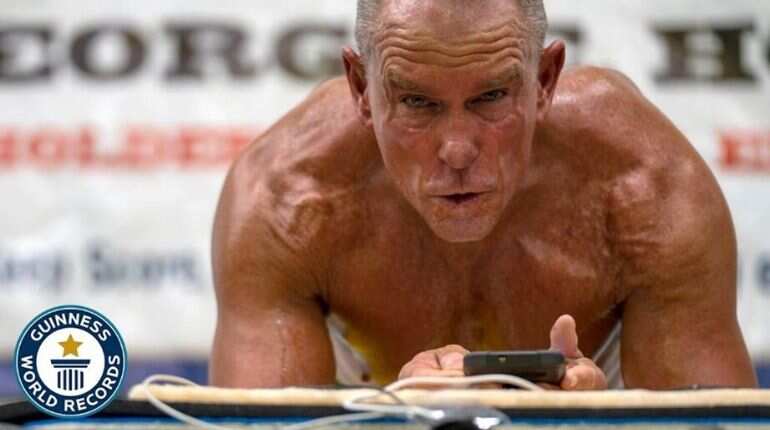 Former Marine George Hood breaks plank world record at 62