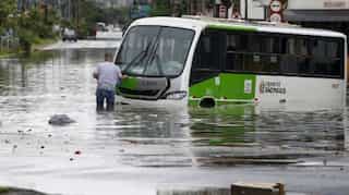 Chaotic climate, chaotic cities fuel Brazil flood toll
