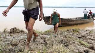 As Myanmar farmers lose their land, sand mining for Singapore is blamed