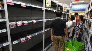Indonesia seizes half a million virus masks amid panic buying