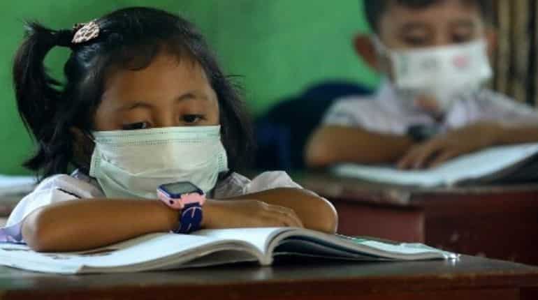 Out of school, but still together