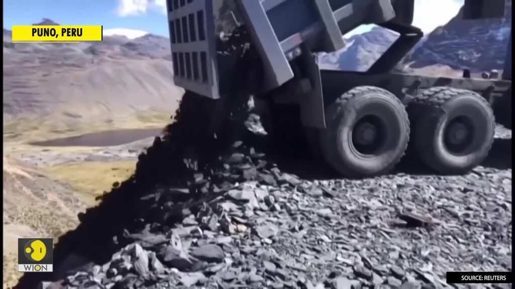 High in the Andes, Peruvian women dig for a few gold flakes in mining leftovers
