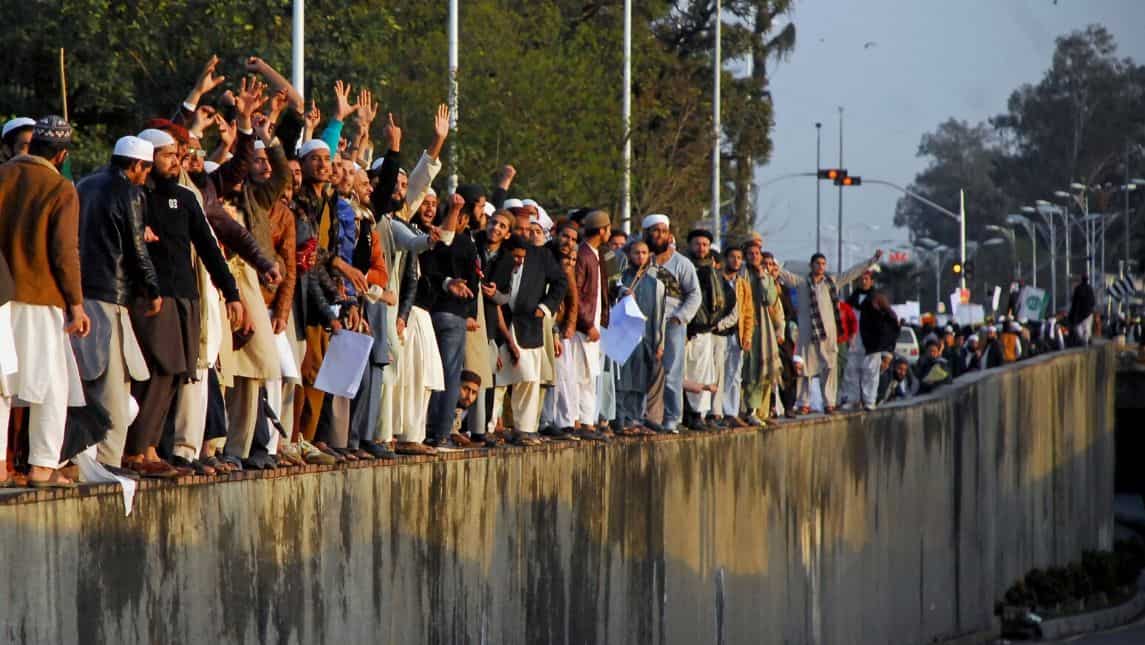 Men protesting near the site