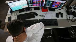 Sensex, Nifty flat ahead of GDP data; autos rise